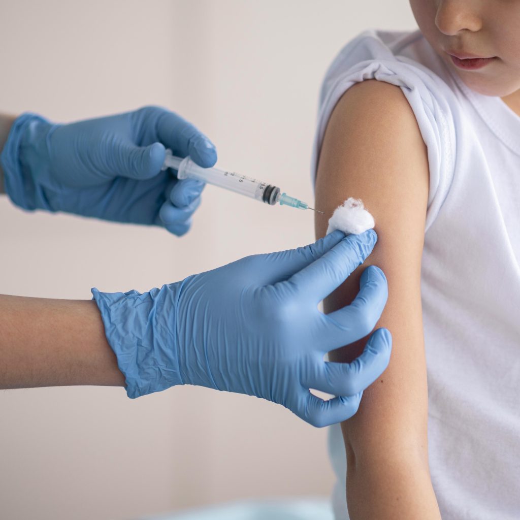little girl vaccinating coronavirus hospital
