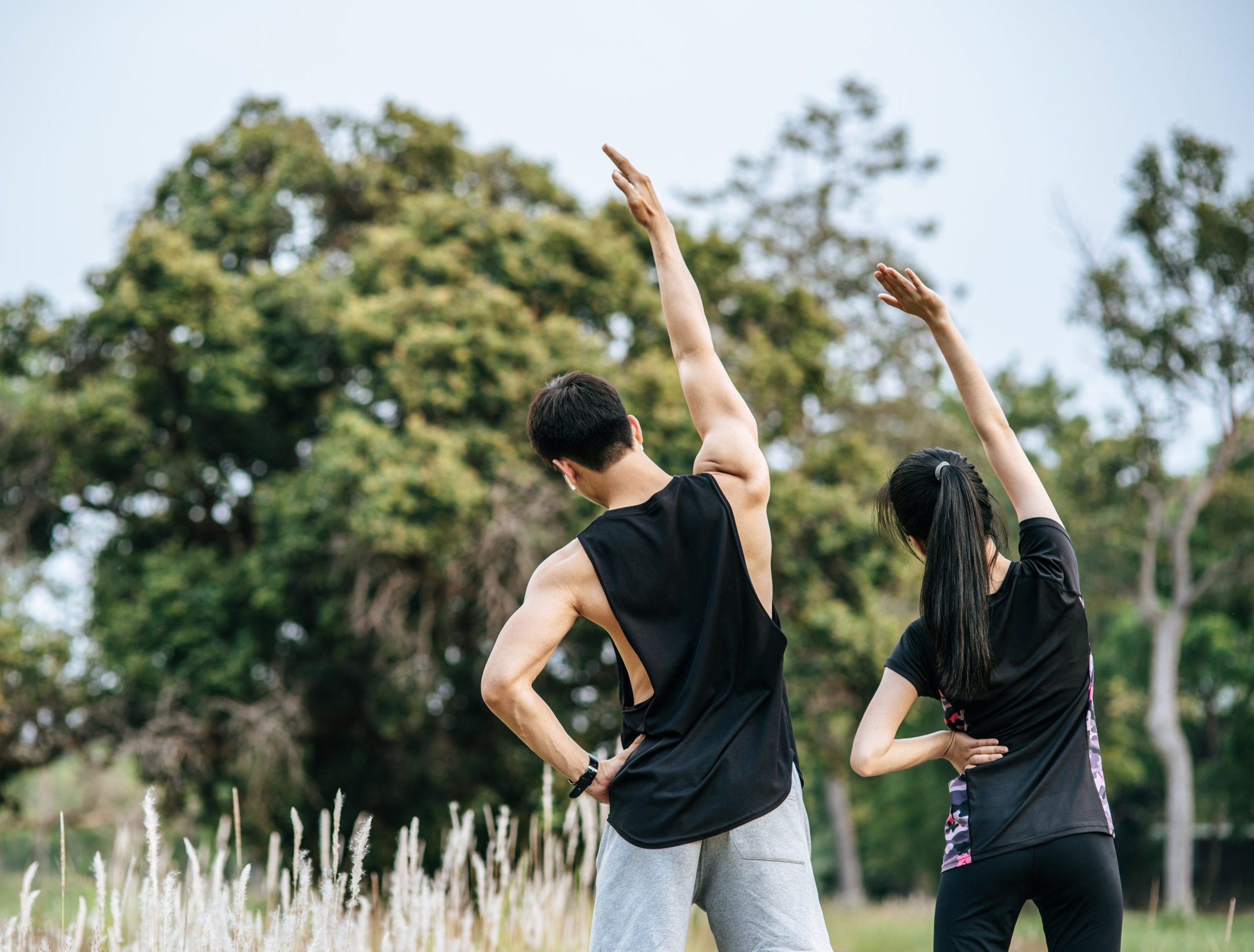 men and women warm up before and after exercising.